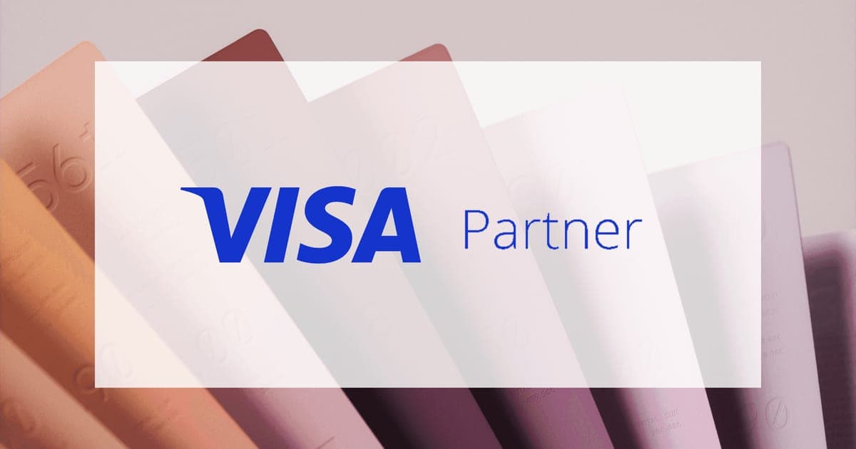 The Visa Partner logo on a white panel over folded pastel paper printed like receipts