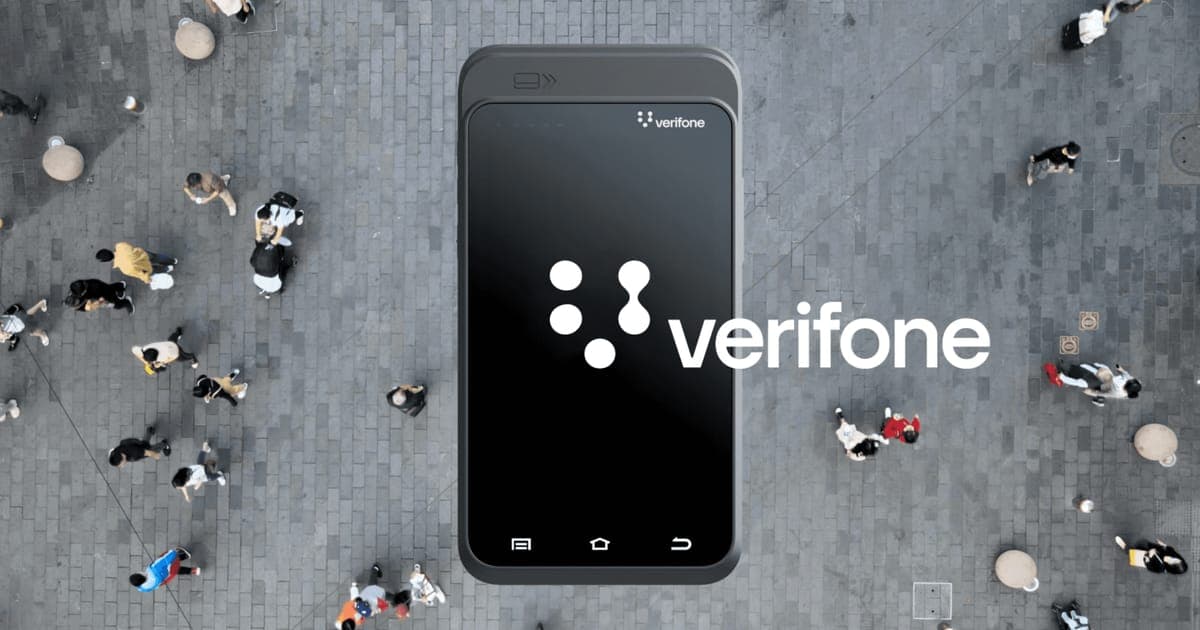 The Verifone logo beside a card terminal, over an overhead photo of people crossing a paved square